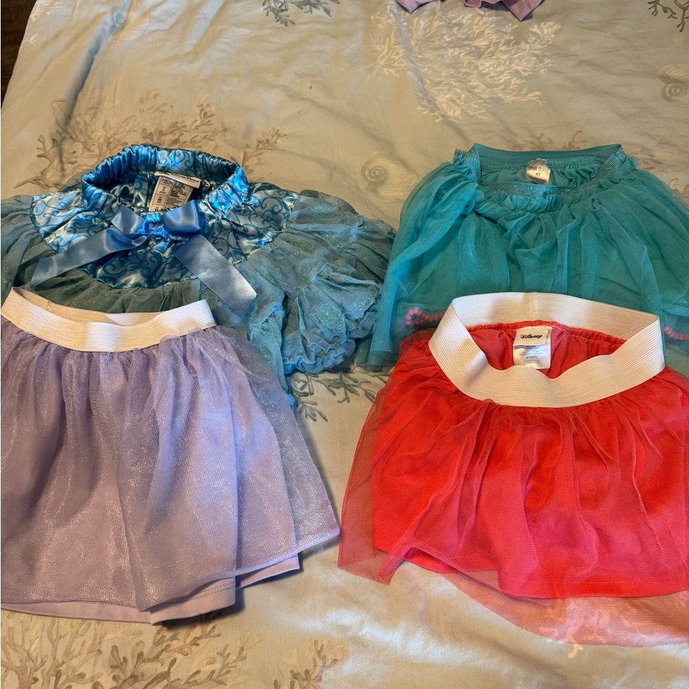 4 girls tutus size 4T GUC